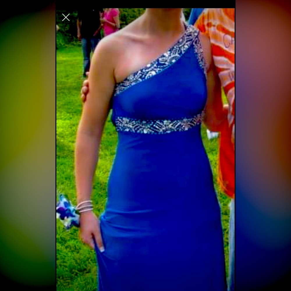 Royal blue gown with silver beaded trim and one side strap